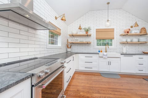 Fully stocked kitchen. Crockpot, blender, toaster, baking dishes, cookie trays, hand mixer, griddle and so much more!