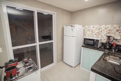 Apartment | Private kitchen | Fridge, microwave, cookware/dishes/utensils