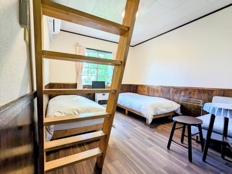 Quadruple Room with Shared Bathroom | Down comforters, free WiFi, bed sheets