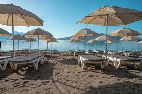 Private beach, sun loungers, beach umbrellas