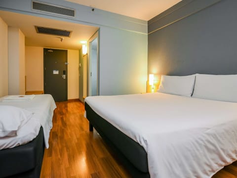 Standard Room, Multiple Beds | Minibar, in-room safe, desk, iron/ironing board