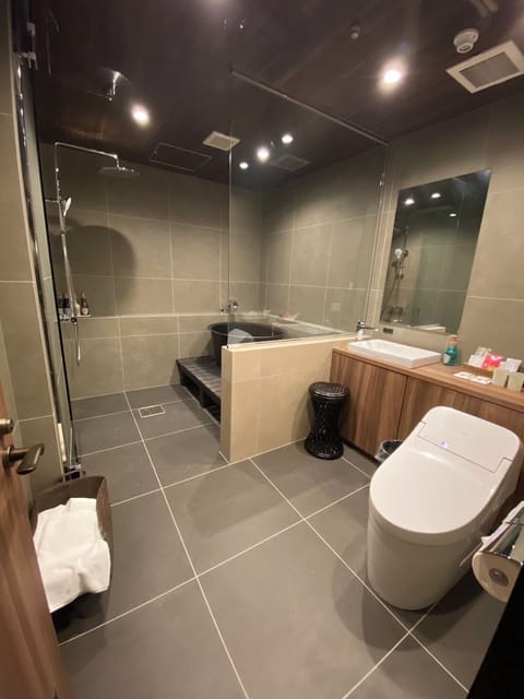 Japanese-Style Quadruple Room, Non-Smoking | Bathroom | Combined shower/tub, hair dryer, slippers, electronic bidet