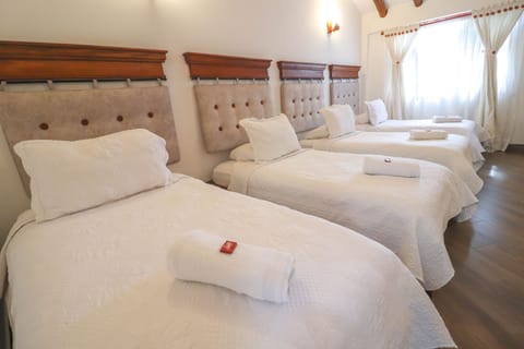 Family Room | Premium bedding, down comforters, free WiFi, bed sheets