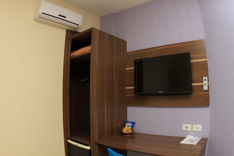 Single Room, 1 Double Bed, City View | Minibar, desk, laptop workspace, blackout drapes