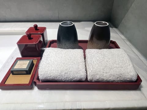 Premium King Room | Bathroom | Deep soaking tub, free toiletries, hair dryer, bathrobes