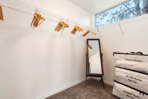 The walk-in closet adds to the feeling of elegance.