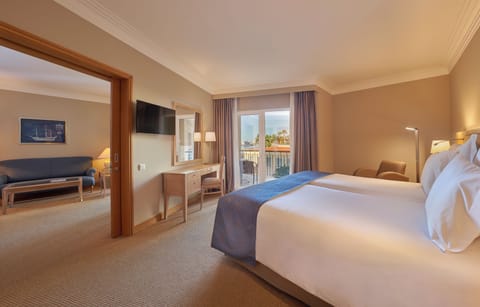 Junior Suite | In-room safe, blackout drapes, iron/ironing board, free WiFi