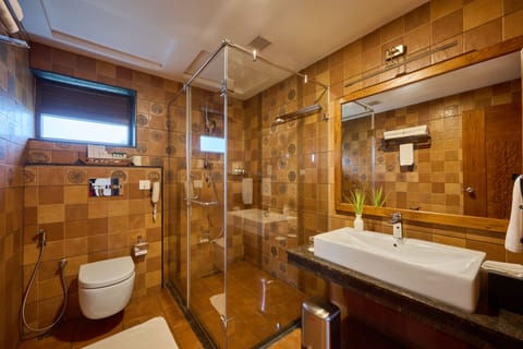 Luxury Studio Suite, 1 Bedroom, Balcony, Lake View | Bathroom | Shower, rainfall showerhead, hair dryer, bathrobes