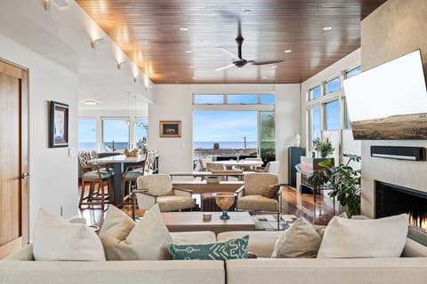 Top Floor: Living Room with Fireplace and Smart TV