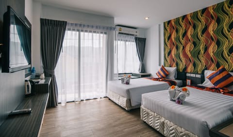 Deluxe Double Room, Balcony | In-room safe, desk, free WiFi, bed sheets