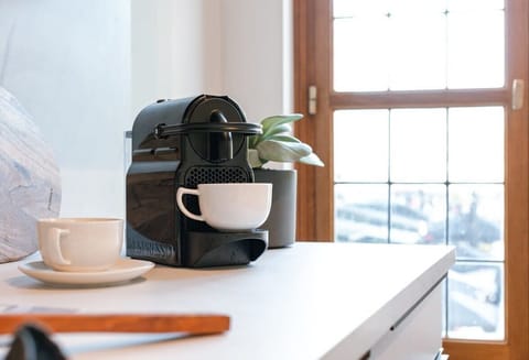 Enjoy a cup of Nespresso coffee