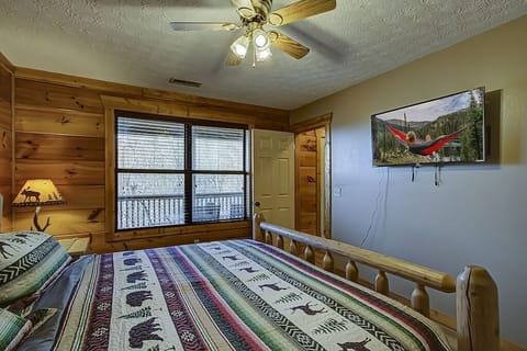 Cuddle up in the King-sized bed and stream your favorites on the 43" smart TV