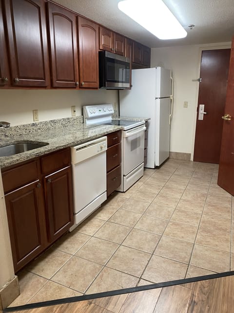 Basic Studio, 1 Queen Bed, Smoking, Hot Tub | Private kitchen | Full-size fridge, microwave, oven, stovetop