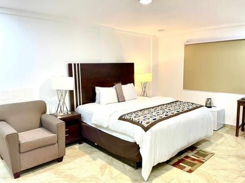 Economy Room, 1 Bedroom | Down comforters, desk, soundproofing, iron/ironing board