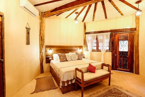 Luxury Room, 1 King Bed, Jetted Tub, Garden Area | In-room safe, iron/ironing board, free WiFi, bed sheets