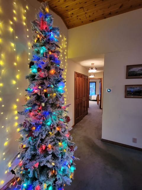 Let's go to the bedrooms thru the cabin style soft hallway lighting