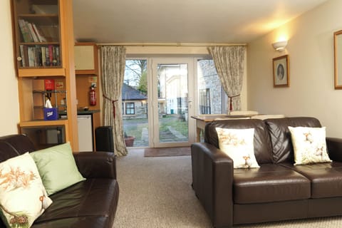 Basic Cottage | Living area | 32-inch Smart TV with cable channels