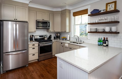 Cook, dine, and gather in the beautifully equipped kitchen