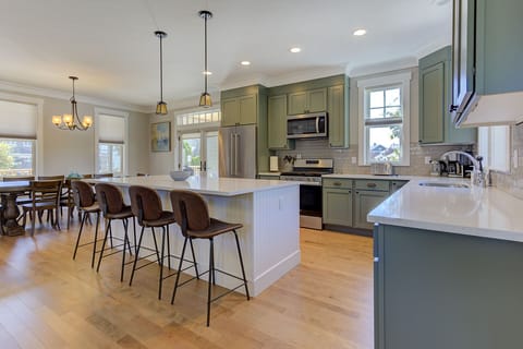 The spacious kitchen island is perfect for meal prep, casual dining and great conversation