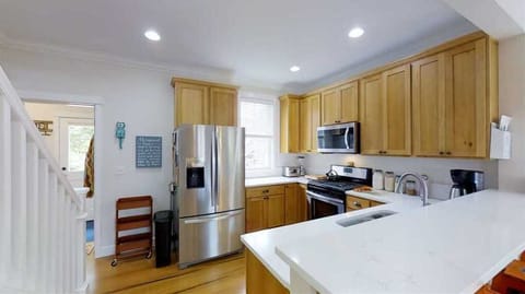 Full kitchen with stainless steel appliances