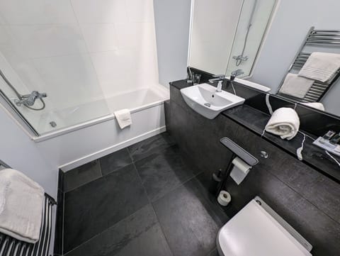Twin Room | Bathroom | Designer toiletries, hair dryer, towels, soap