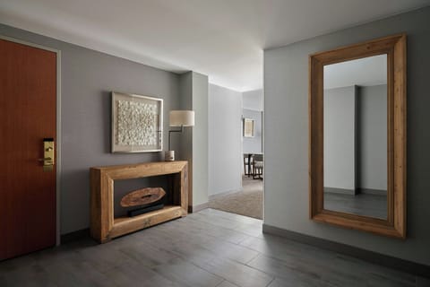 Premium bedding, desk, laptop workspace, blackout drapes