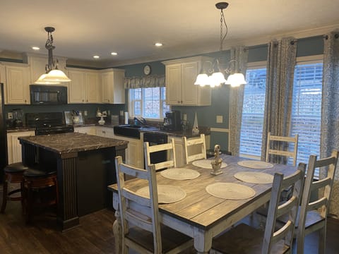 Walk straight into the central living area/kitchen.