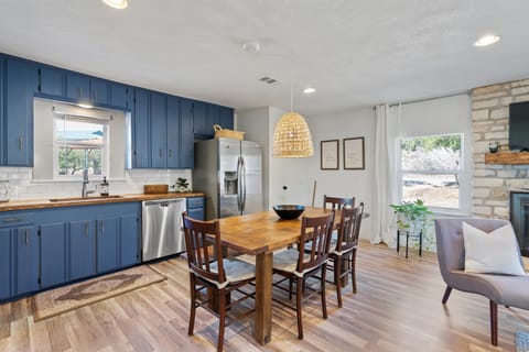 Kitchen/ dining area with a table that seats 7 comfortably!
