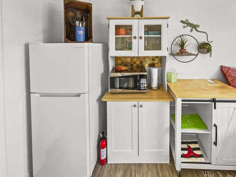 Full refrigerator and microwave and other amenities.