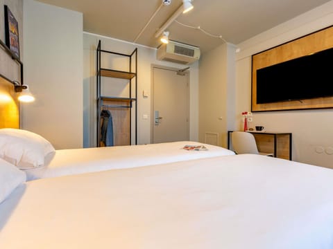 Desk, soundproofing, iron/ironing board, free cribs/infant beds