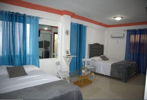 Family Twin Room | In-room safe, blackout drapes, iron/ironing board, free WiFi