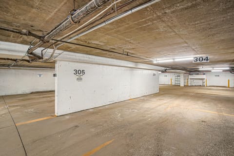 Single reserved covered parking spot. Additional spot on surface lot outside.