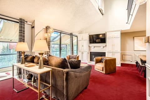 Large living room with Smart TV. Sleeper sofa pulls out to a Queen bed.