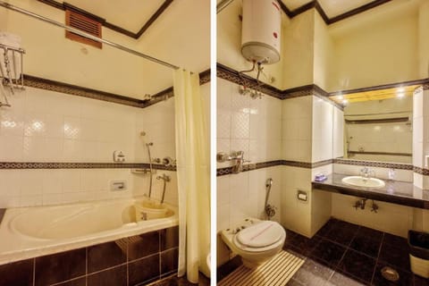 Honeymoon Studio Suite | Bathroom | Shower, free toiletries, towels, soap