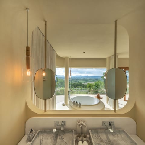 sala signature villa one | Bathroom | Separate tub and shower, rainfall showerhead, free toiletries