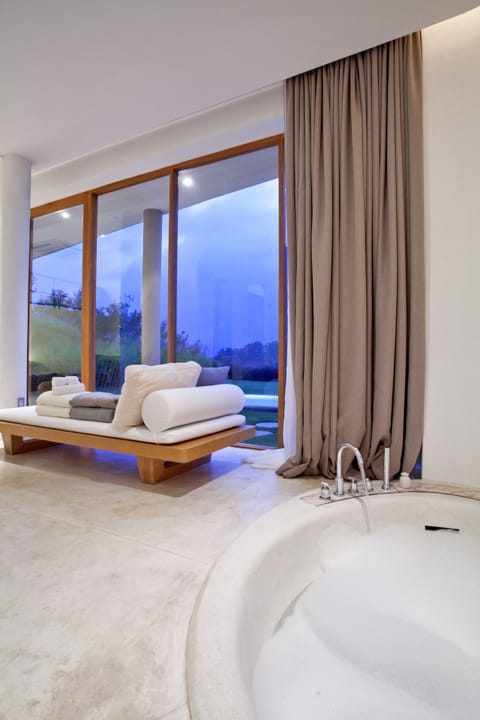 one bedroom pool villa suite | Bathroom | Separate tub and shower, rainfall showerhead, free toiletries