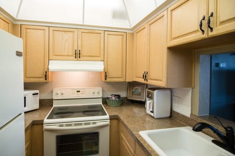 Executive Suite, 1 King Bed (Waterfront) | Private kitchen | Fridge, coffee/tea maker, toaster