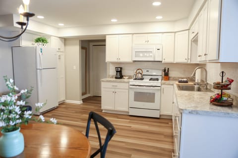 Gas Stove, snacks and coffee fully stocked kitchen.