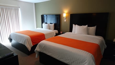 Suite, 2 Double Beds | In-room safe, desk, iron/ironing board, free WiFi
