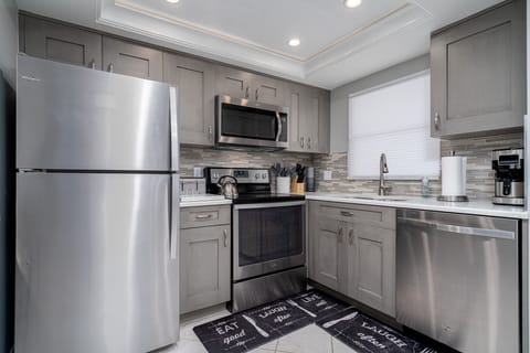 Condo, 2 Bedrooms | Private kitchen | Fridge, oven, coffee/tea maker