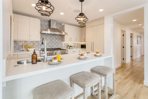 Barstool seating at the kitchen.