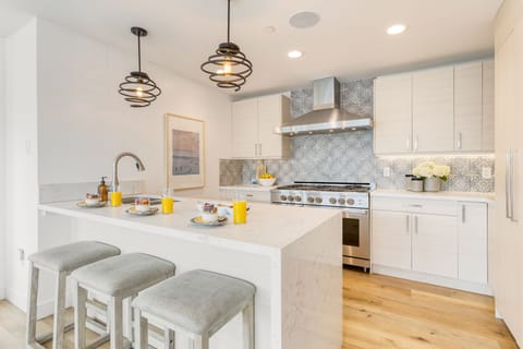 Chic kitchen with barstool seating.
