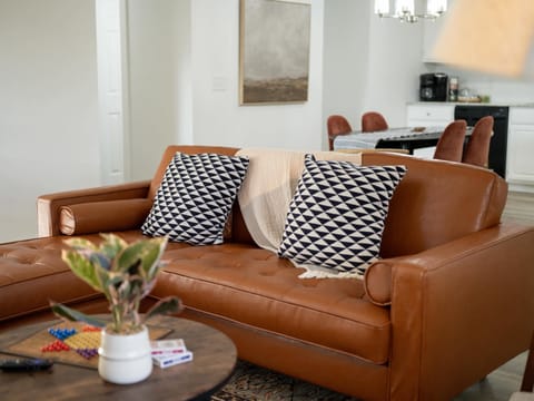 The subtle artistry of curated design, where function meets aesthetic appeal. This living room whispers stories of tranquility.