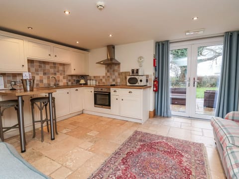 Fridge, electric kettle, toaster, cookware/dishes/utensils