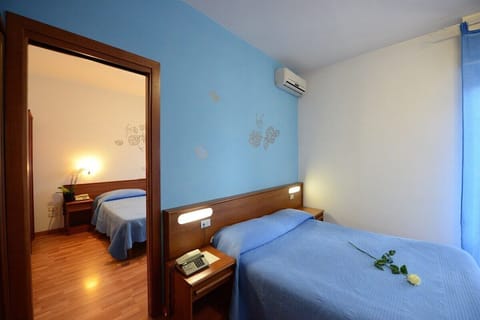 Standard Quadruple Room | Desk, iron/ironing board, free WiFi, bed sheets