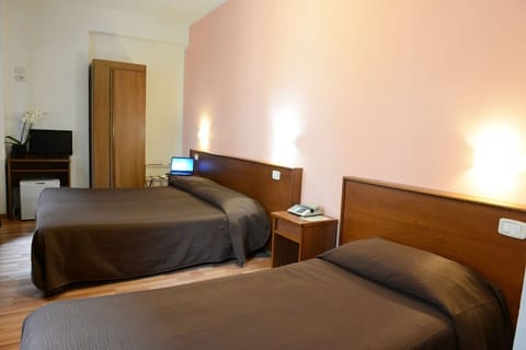 Standard Triple Room | Desk, iron/ironing board, free WiFi, bed sheets