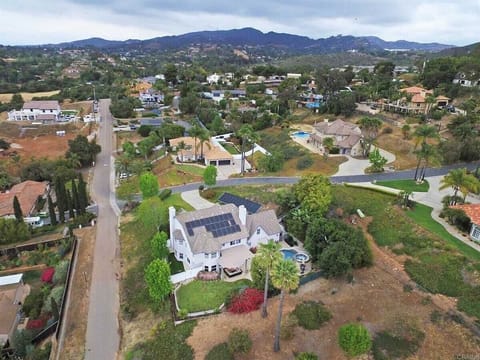Aerial view of your private estate surrounded by scenic hillside charm!
