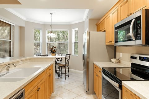 Condo, Multiple Beds, Patio, Garden View (Riverwalk 713) | Private kitchen | Fridge, microwave, oven, stovetop