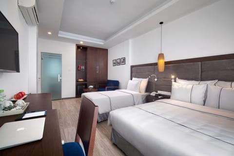 Family Suite, Non Smoking, City View | Premium bedding, pillowtop beds, minibar, in-room safe