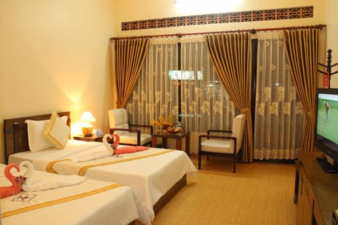 Deluxe Room, Road View (Seaside) | 1 bedroom, premium bedding, minibar, in-room safe